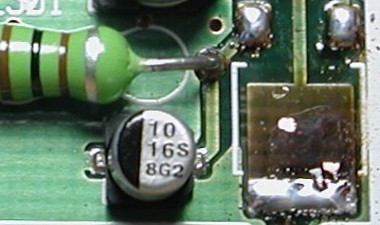Close up showing heat damaged PCB