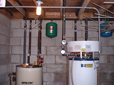 Plumbing- water heater on left, solar heater on right