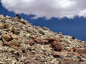 Hikers resting on rim
